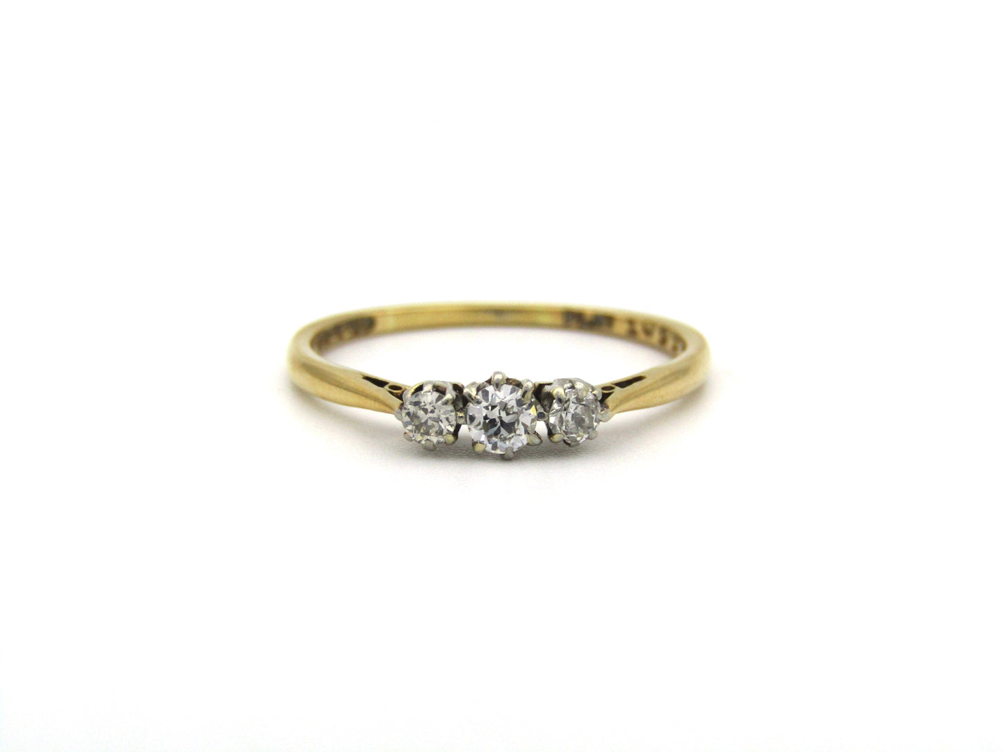 18K gold & platinum Three-stone diamond Edwardian ring, circa 1900.