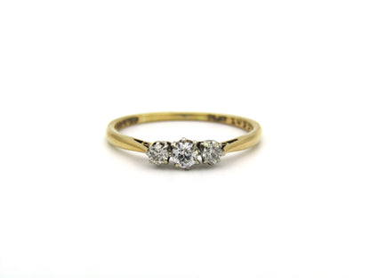 18K gold & platinum Three-stone diamond Edwardian ring, circa 1900.