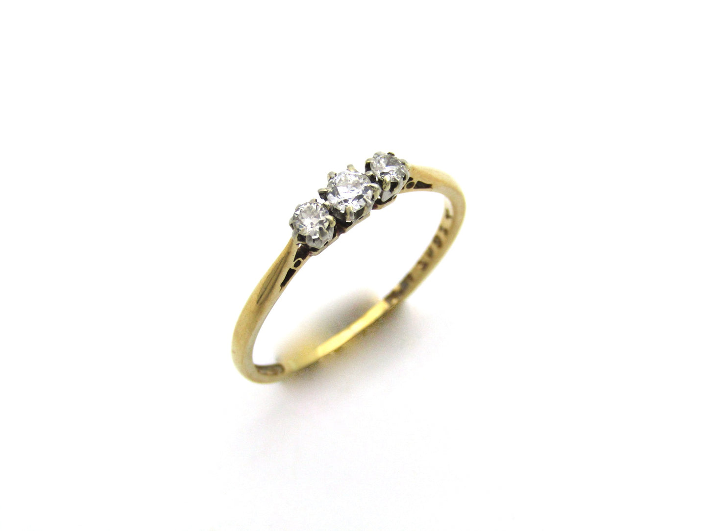 18K gold & platinum Three-stone diamond Edwardian ring, circa 1900.