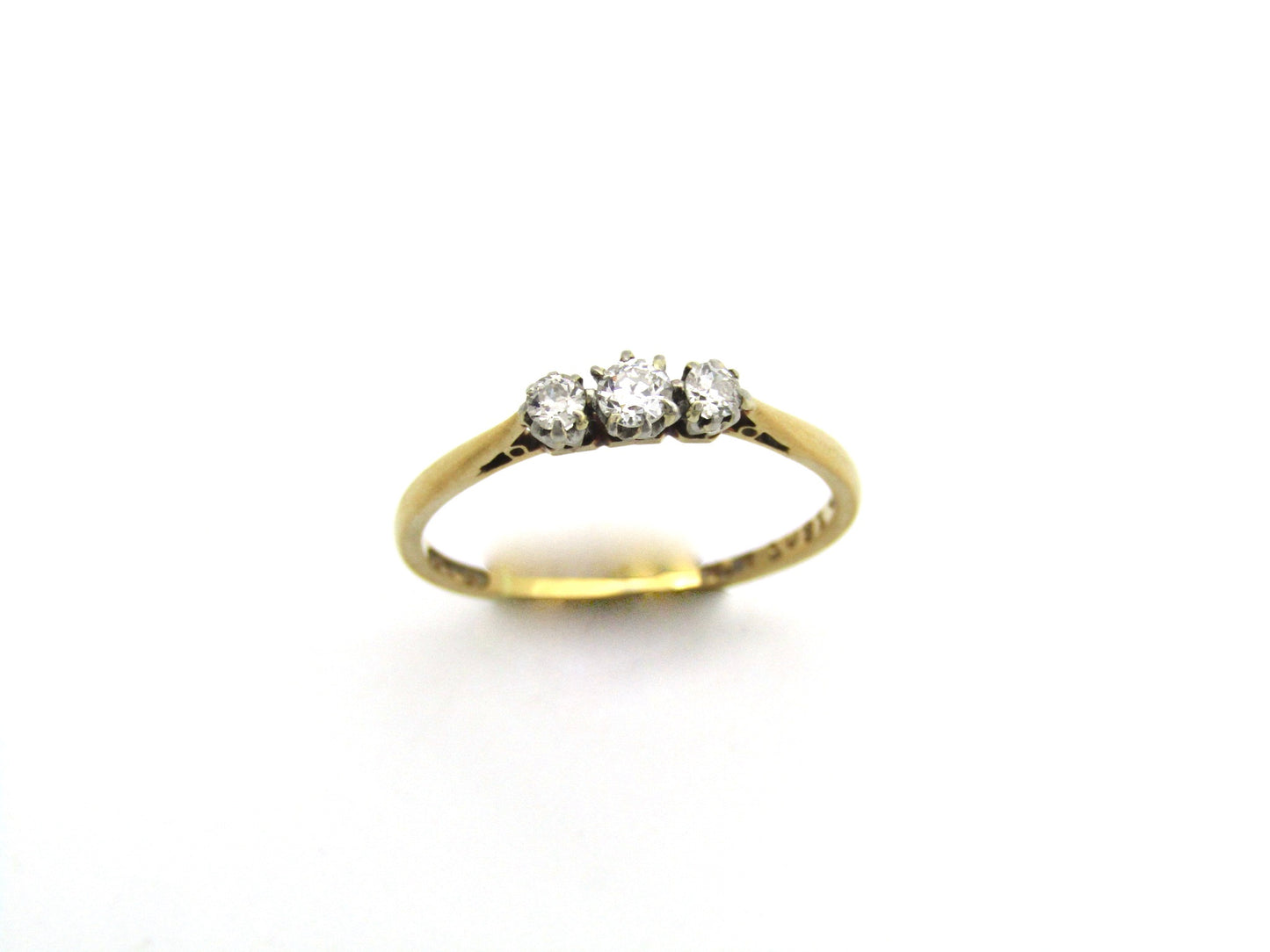 18K gold & platinum Three-stone diamond Edwardian ring, circa 1900.