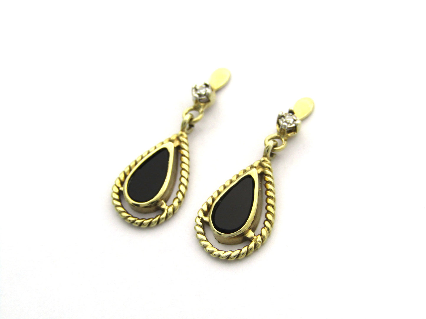 9K gold Vintage onyx and diamond dangle earrings, circa 1990's.