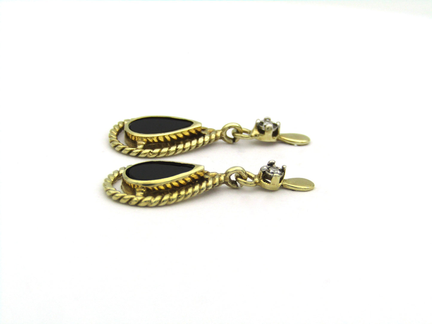 9K gold Vintage onyx and diamond dangle earrings, circa 1990's.