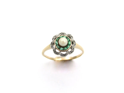 9K gold Edwardian pearl, emerald, and diamond flower ring.