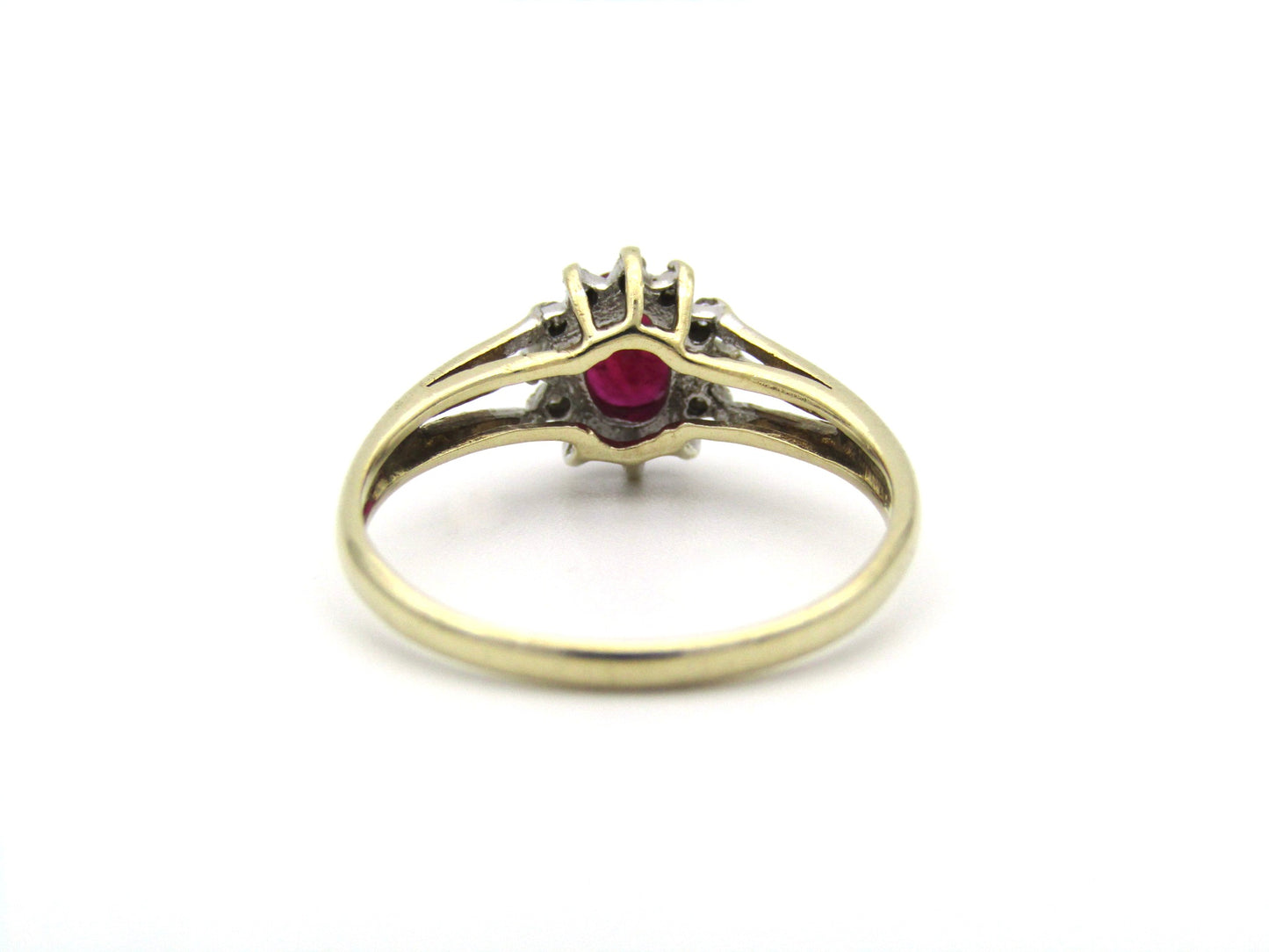 9K gold Vintage ruby and diamond halo ring, Birmingham, 2004.