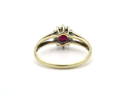 9K gold Vintage ruby and diamond halo ring, Birmingham, 2004.