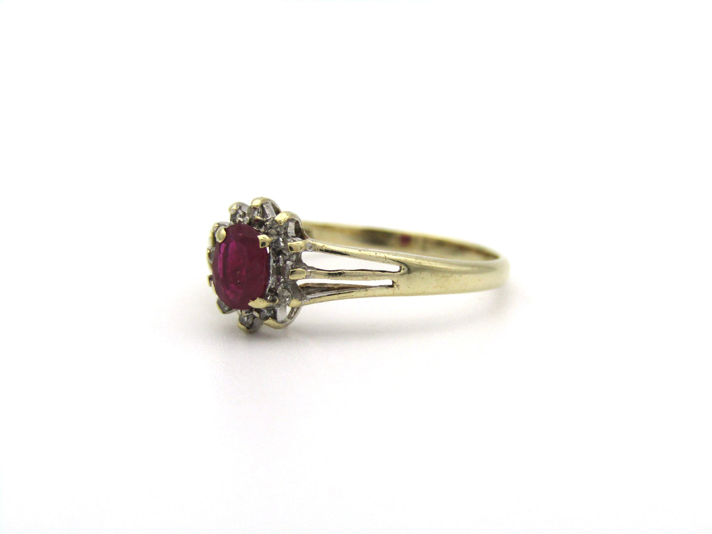 9K gold Vintage ruby and diamond halo ring, Birmingham, 2004.