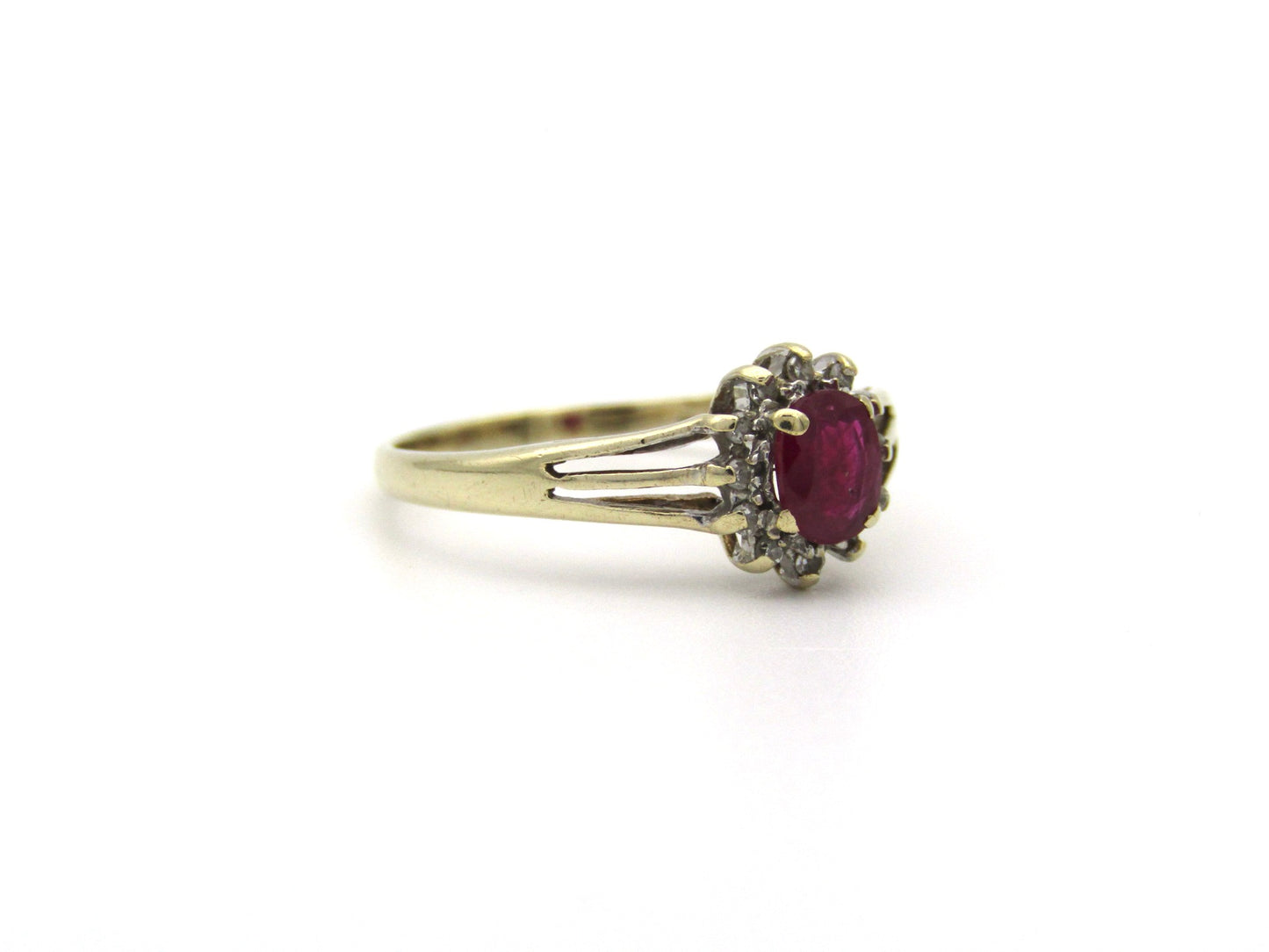 9K gold Vintage ruby and diamond halo ring, Birmingham, 2004.