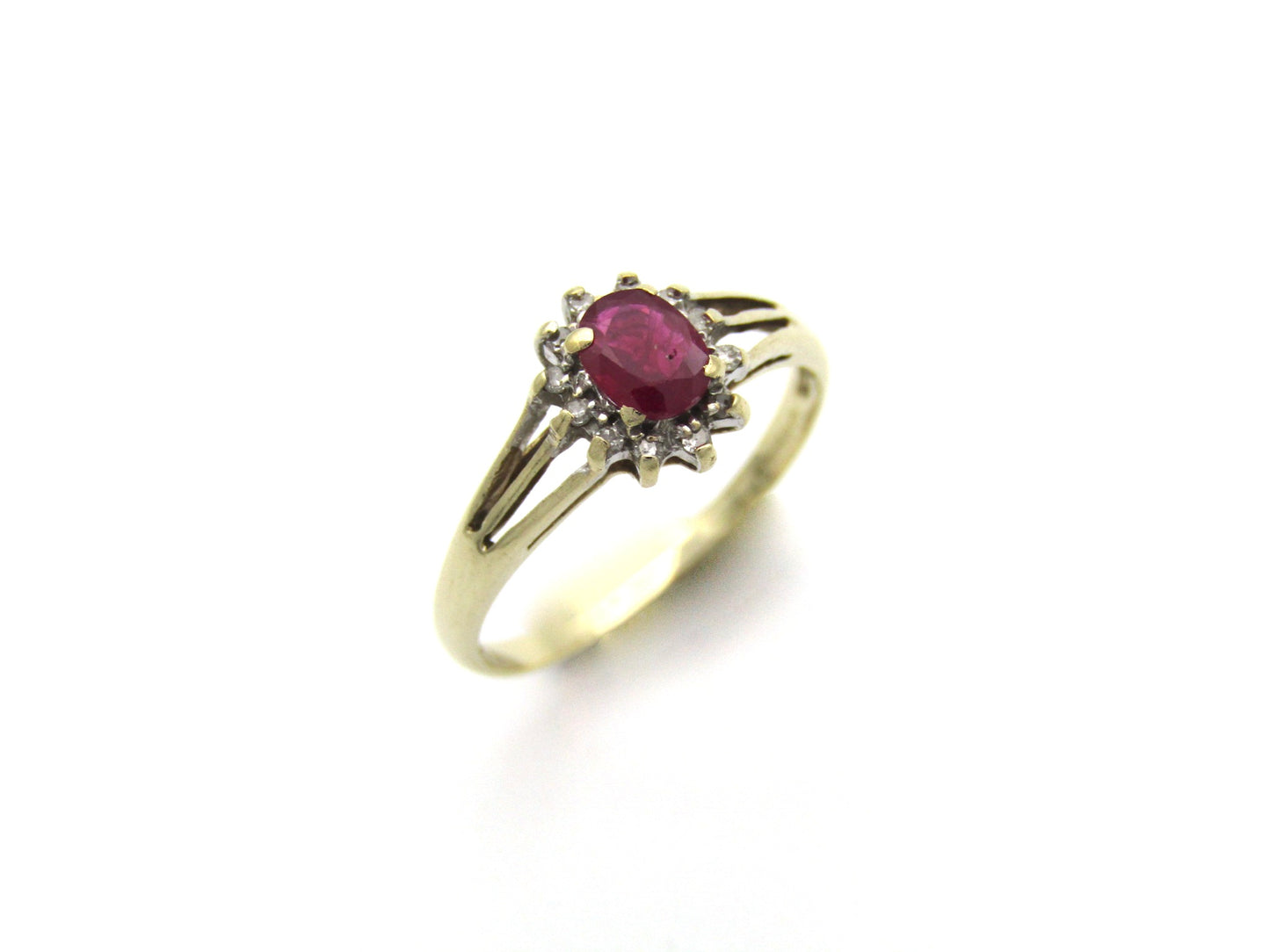 9K gold Vintage ruby and diamond halo ring, Birmingham, 2004.