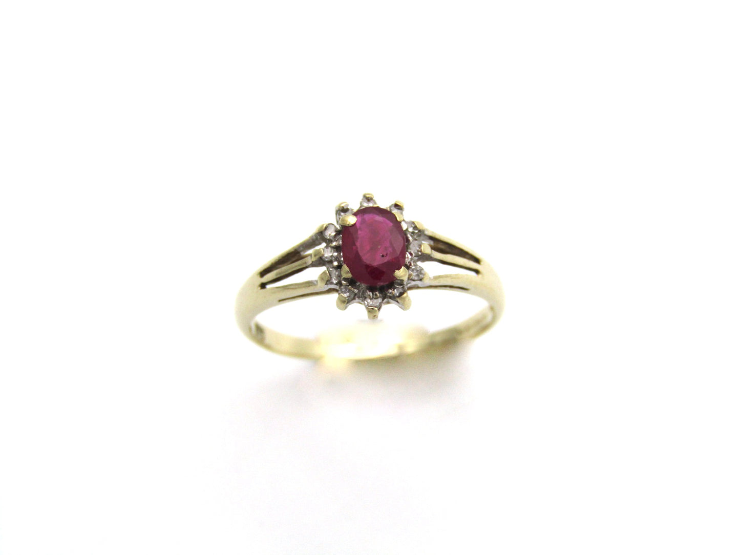 9K gold Vintage ruby and diamond halo ring, Birmingham, 2004.