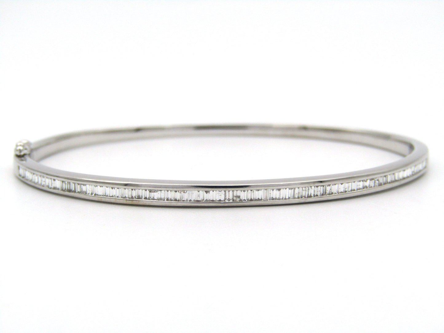 18K gold diamond bangle.