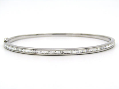 18K gold diamond bangle.