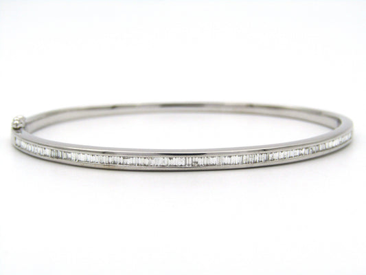 18K gold diamond bangle.
