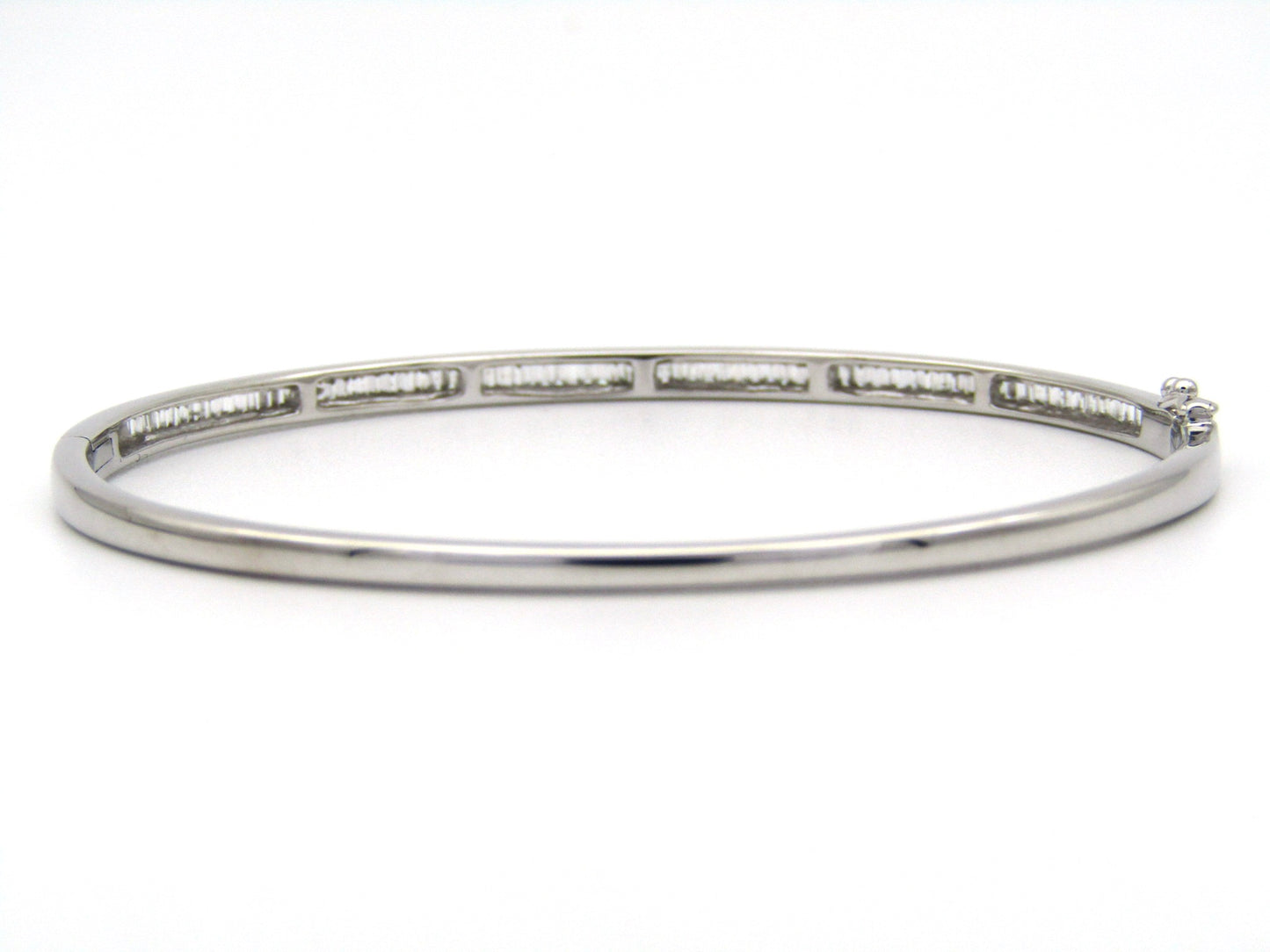 18K gold diamond bangle.