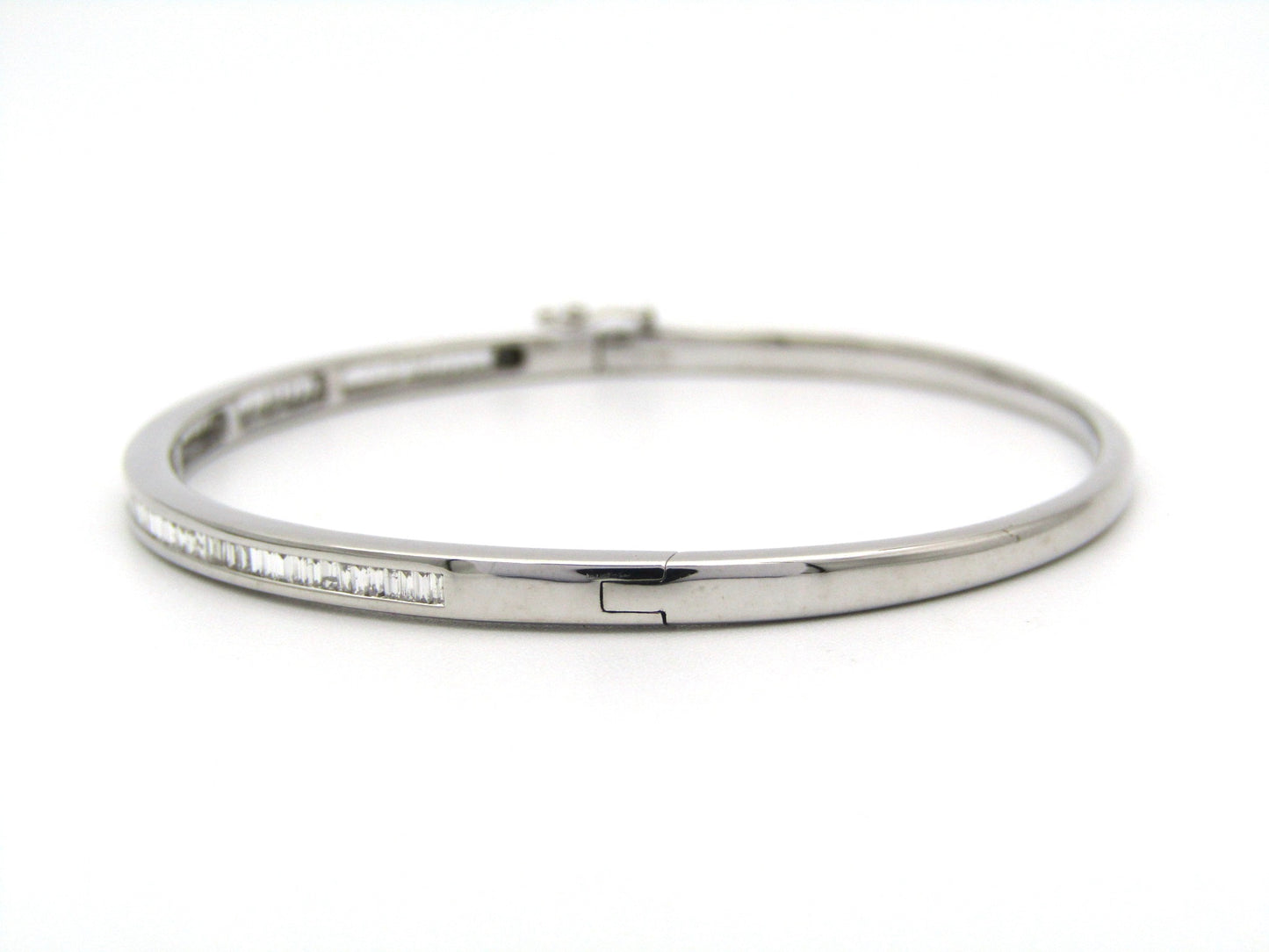 18K gold diamond bangle.