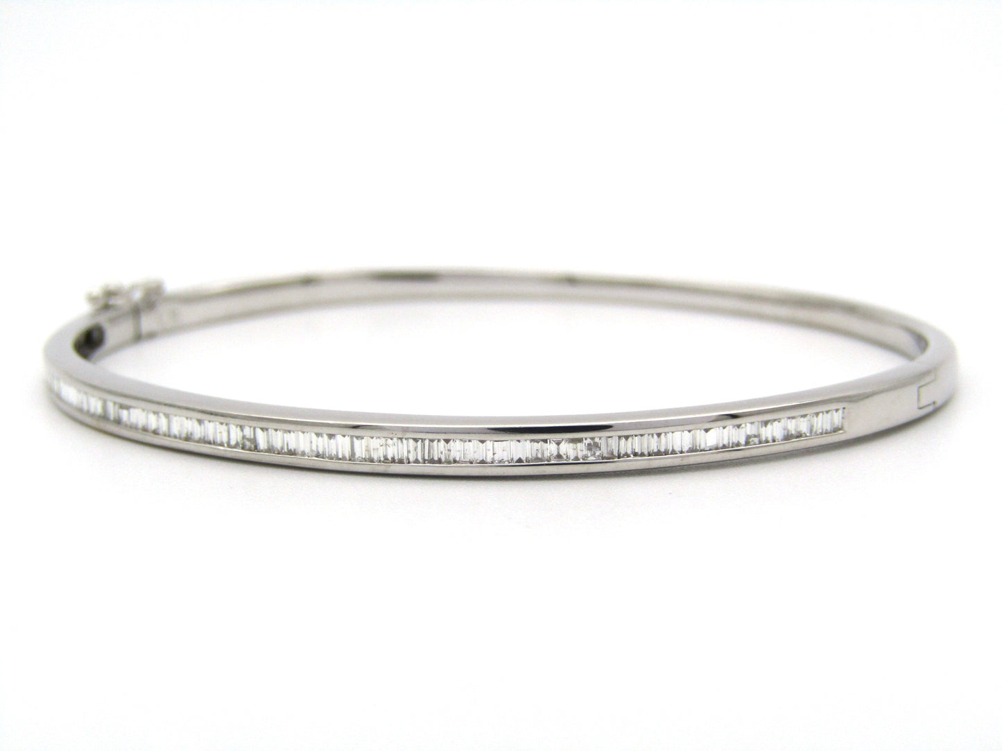 18K gold diamond bangle.