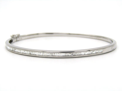 18K gold diamond bangle.