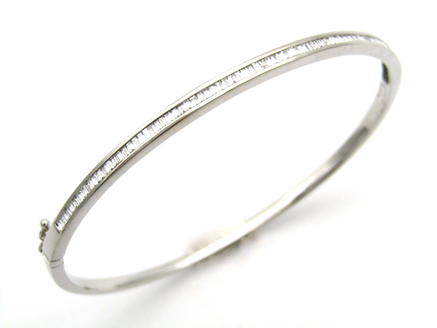 18K gold diamond bangle.