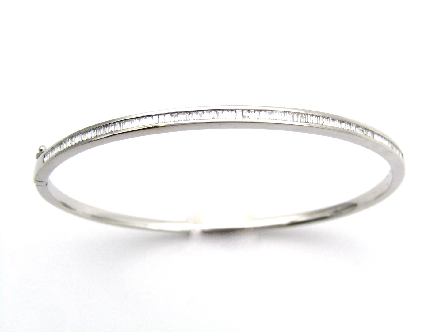 18K gold diamond bangle.