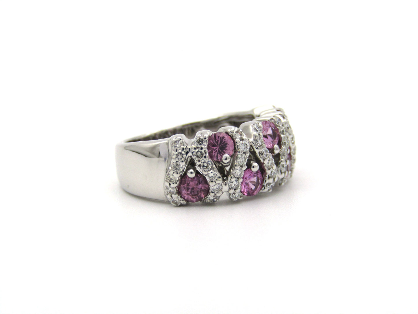 18K gold pink sapphire and diamond ring.