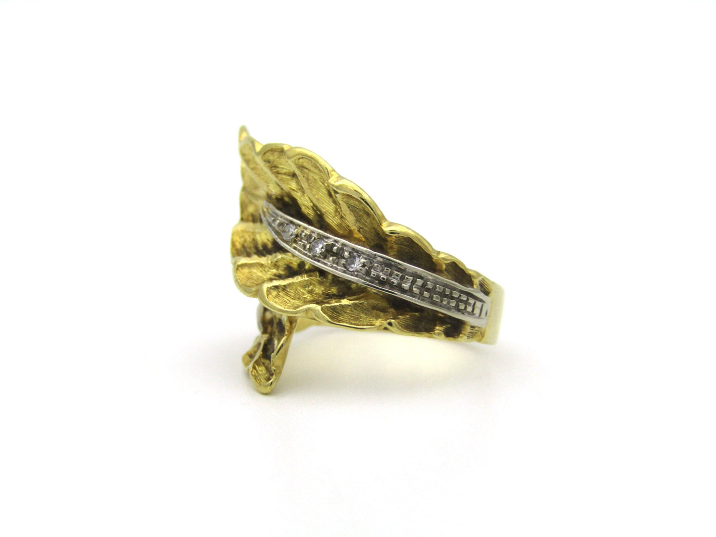 18K gold Retro diamond leaf-wrap ring, circa 1950's.