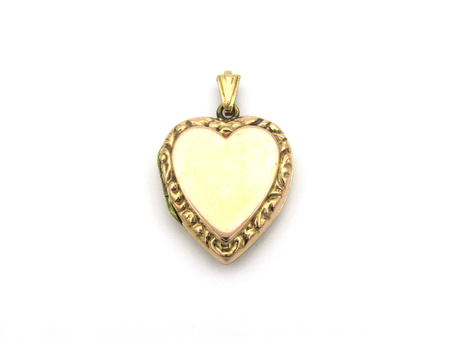 9K gold Edwardian heart locket, circa 1900.
