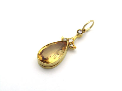 18K gold Edwardian topaz and diamond pendant, circa 1900.