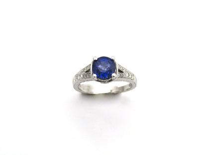 14K gold sapphire and diamond ring.
