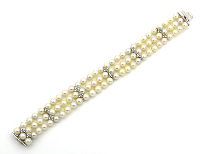18K gold three-strand akoya cultured pearl bracelet, circa 1980's.