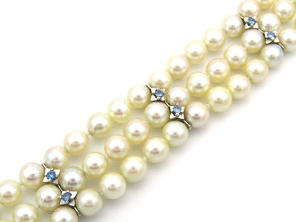 18K gold three-strand akoya cultured pearl bracelet, circa 1980's.