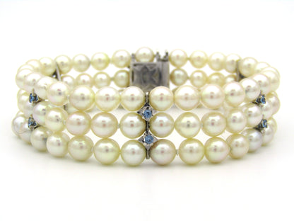 18K gold three-strand akoya cultured pearl bracelet, circa 1980's.