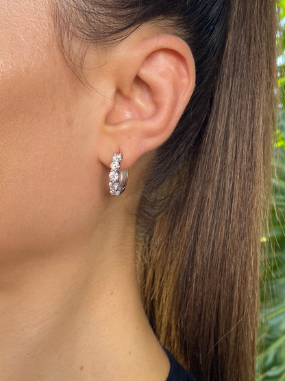18K gold Diamond Protea huggie earrings by Browns.