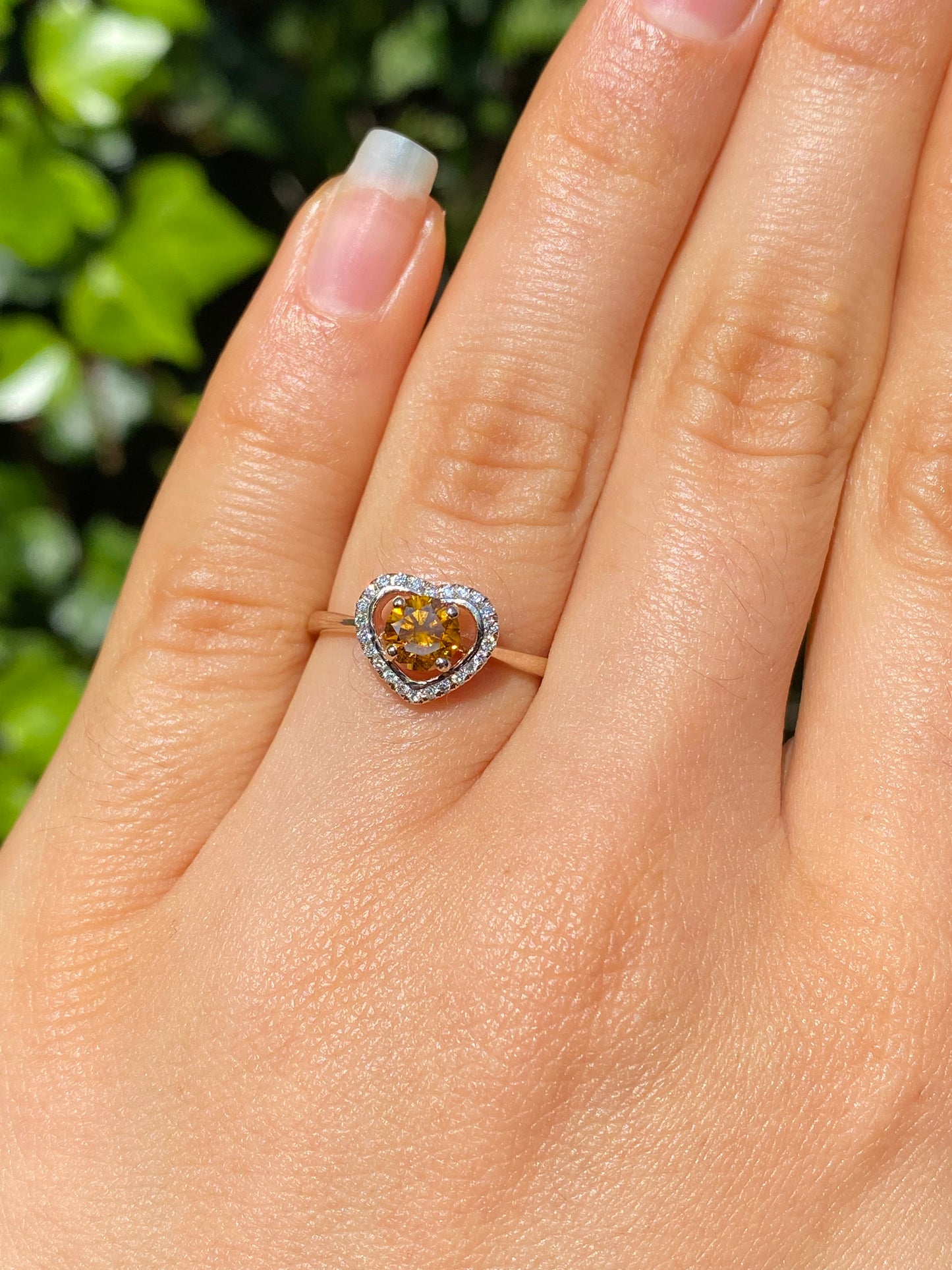 18K gold Orange diamond halo ring.
