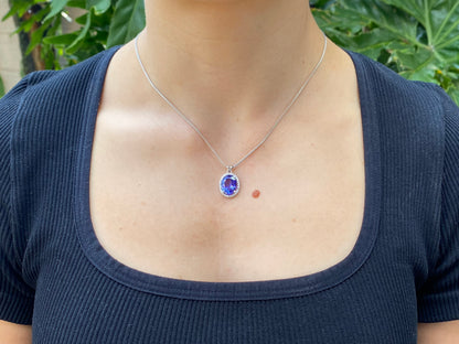 18K gold tanzanite and diamond pendant.