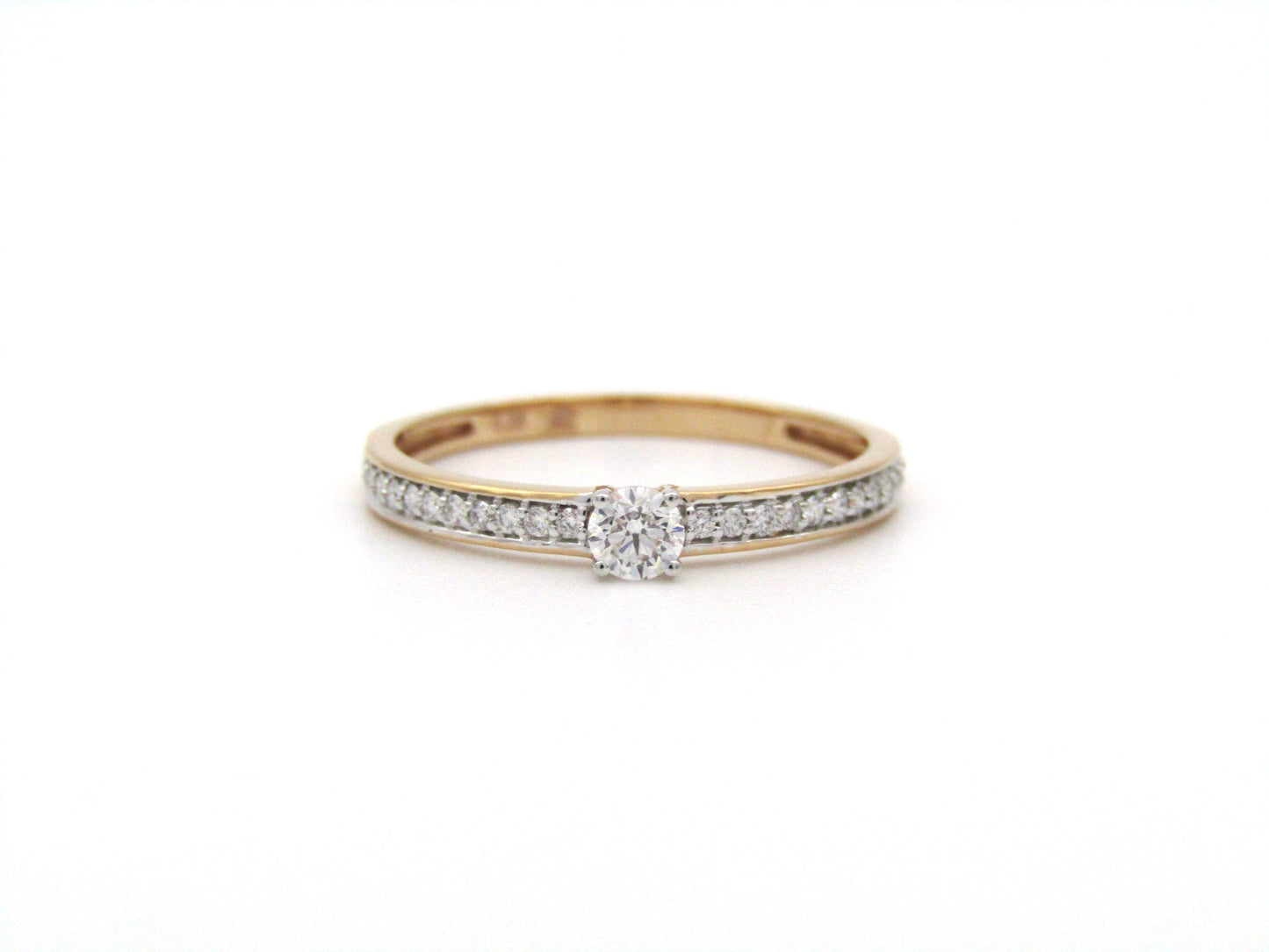 18K gold diamond ring.