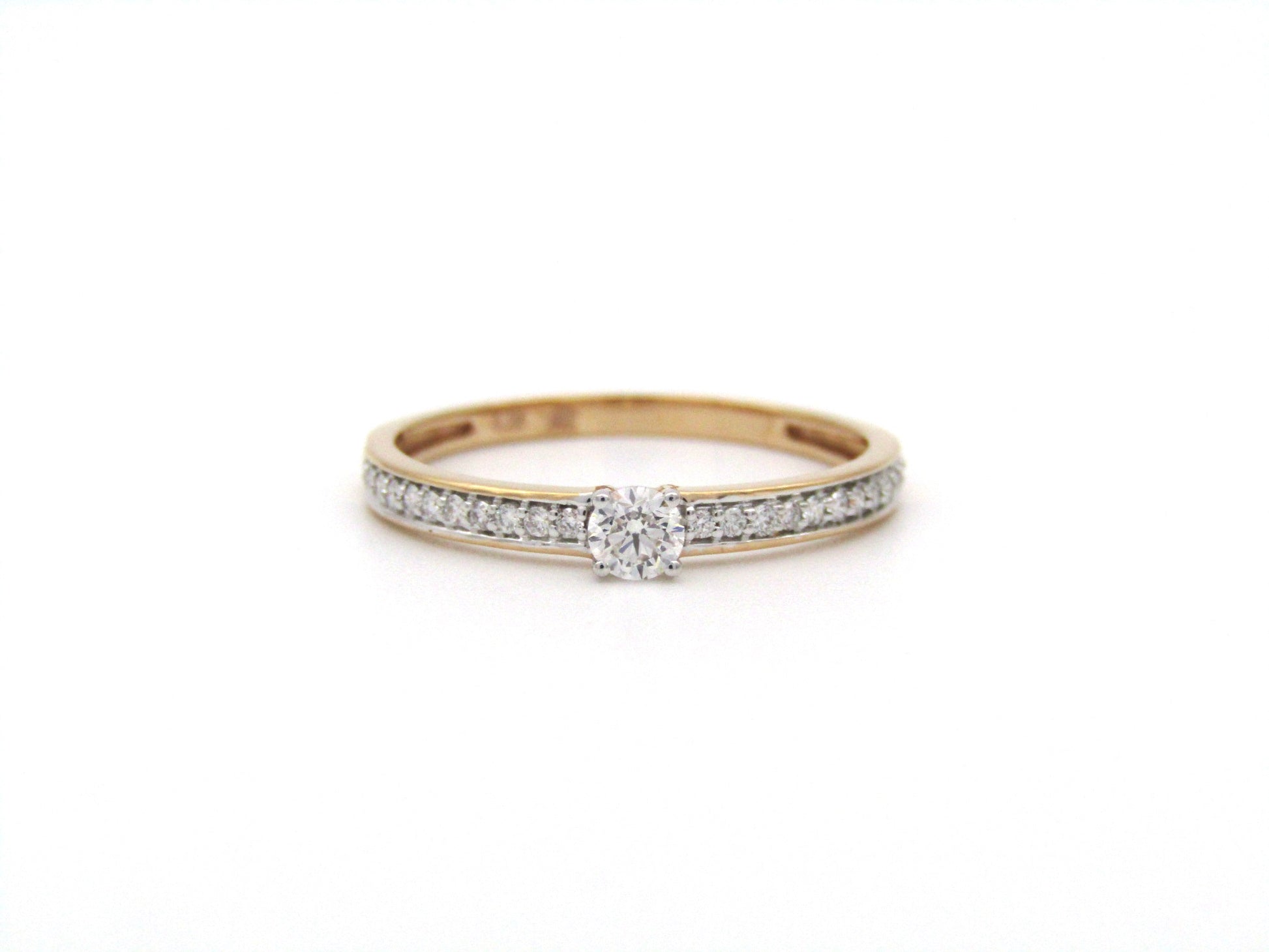 18K gold diamond ring.
