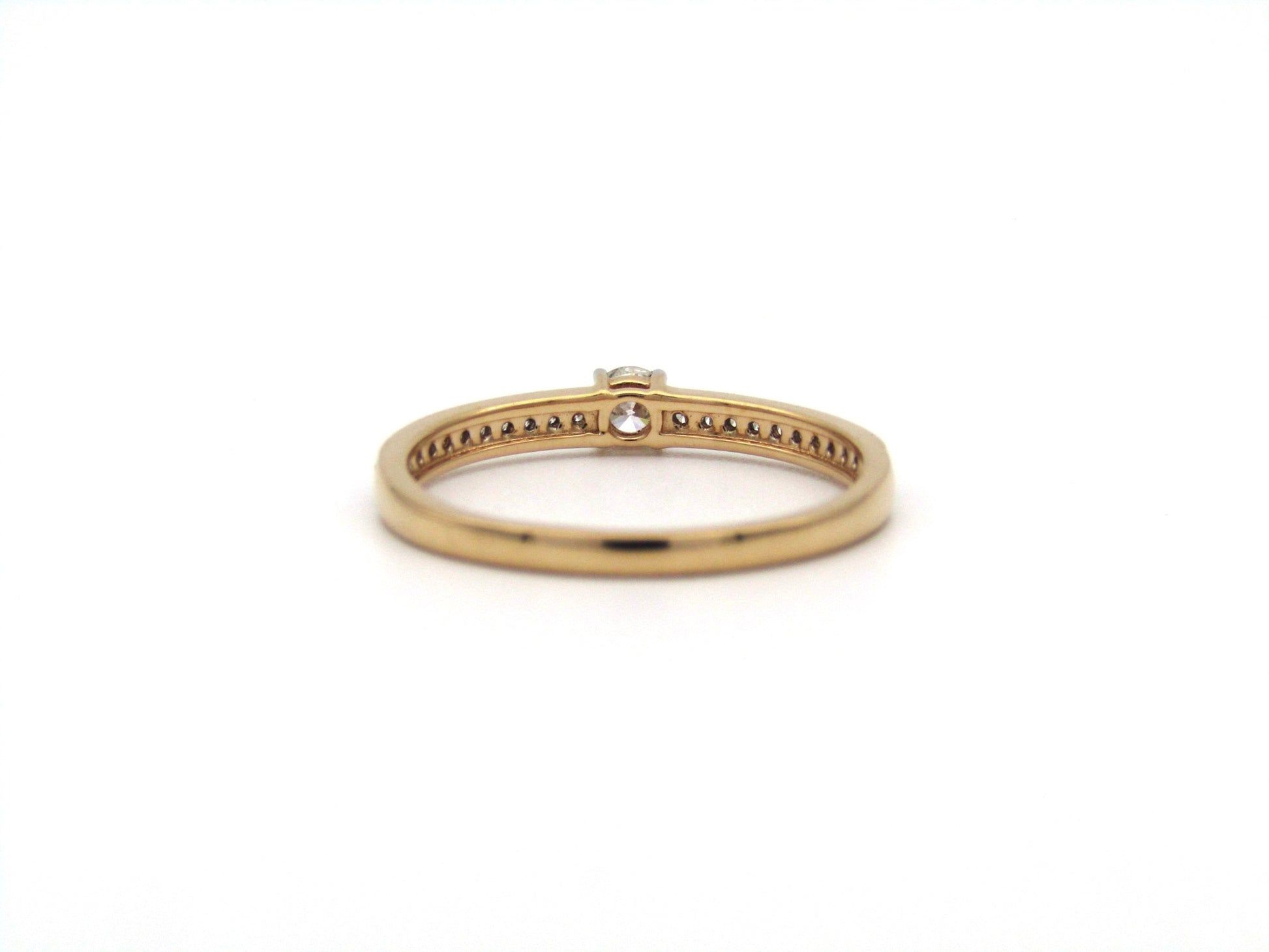 18K gold diamond ring.