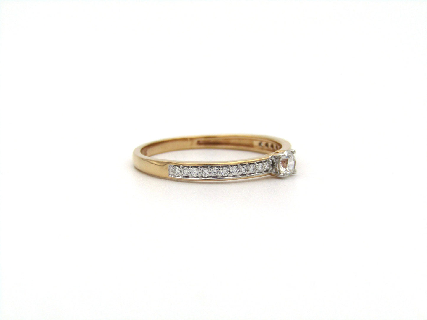 18K gold diamond ring.