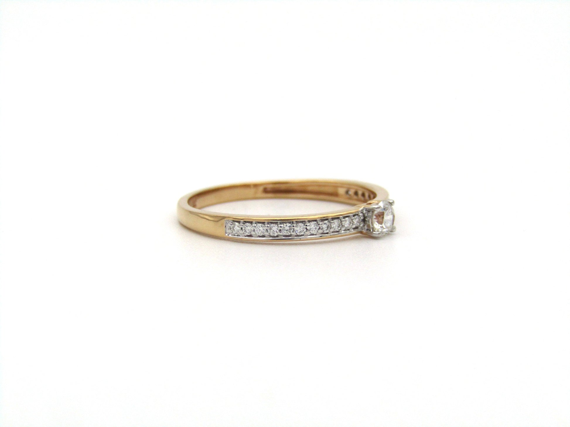 18K gold diamond ring.
