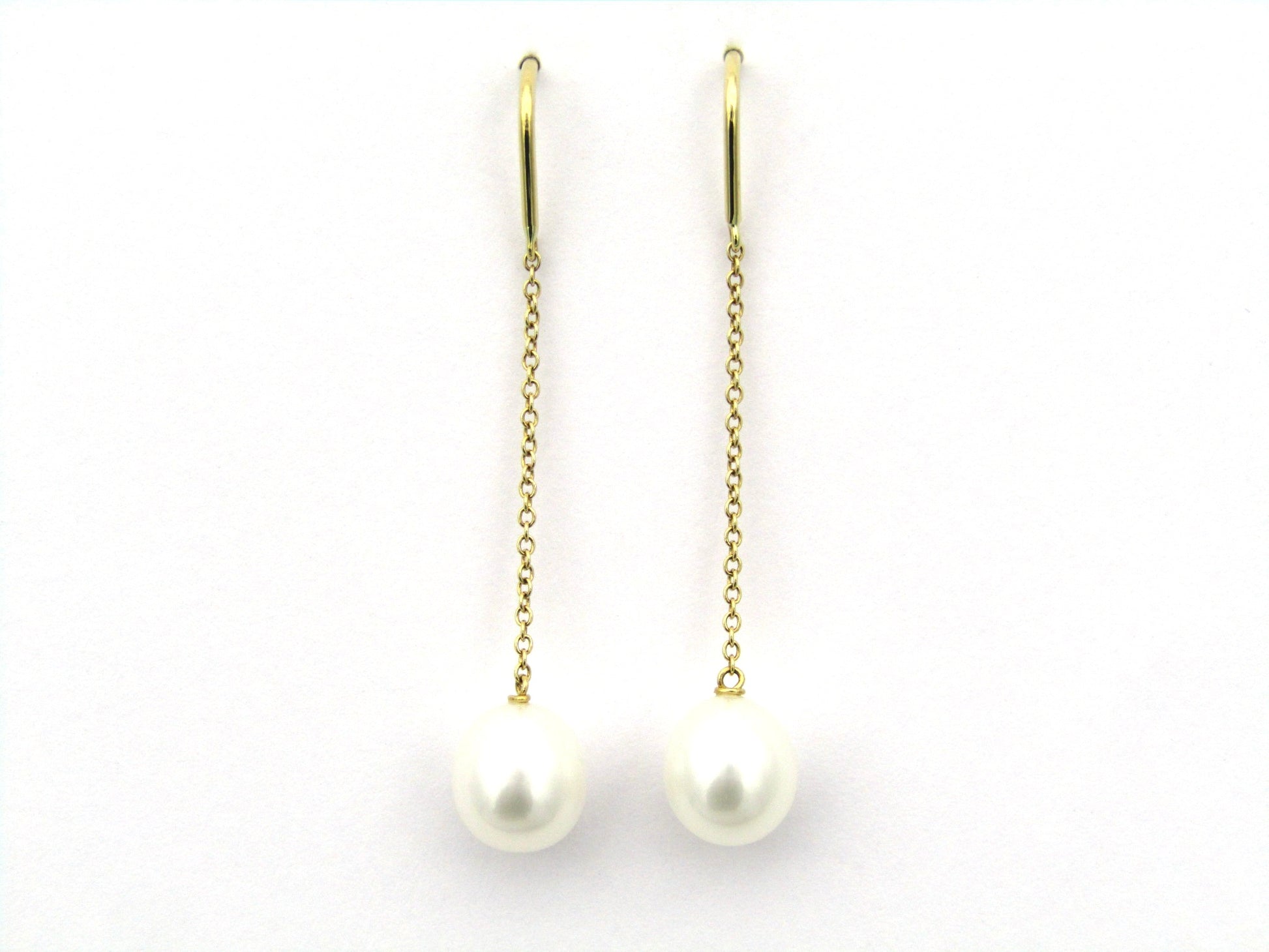 18K gold Tiffany & Co. "Pearls by the Yard" chain earrings.