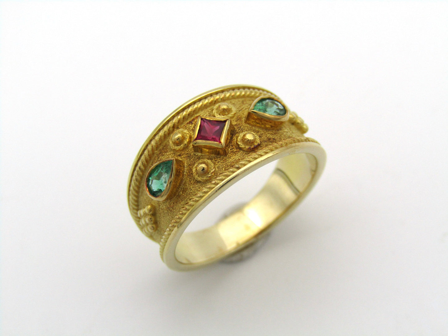 14K gold ruby and emerald ring.