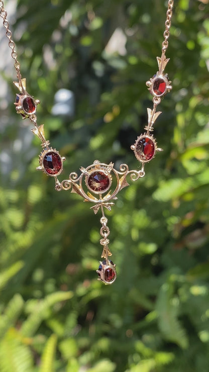 9K gold Edwardian garnet necklace, circa 1910.