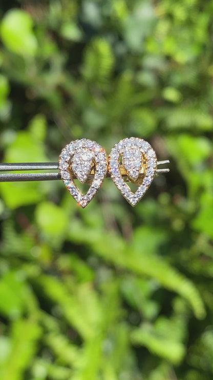 18K gold diamond earrings.