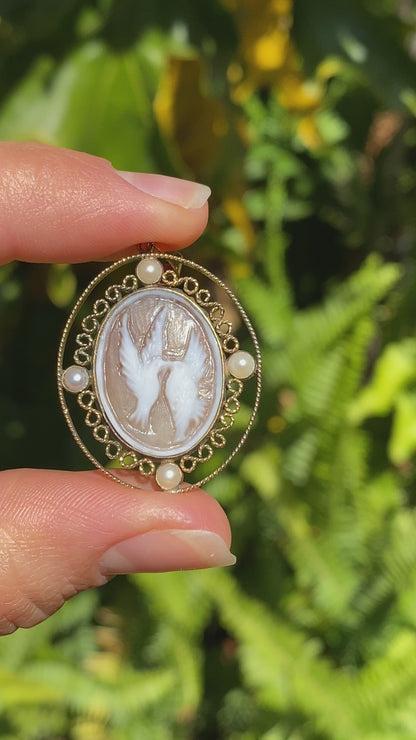 9K gold conch shell cameo and cultured akoya pearl pendant.