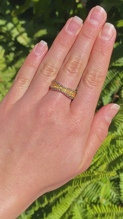 18K gold diamond band ring.