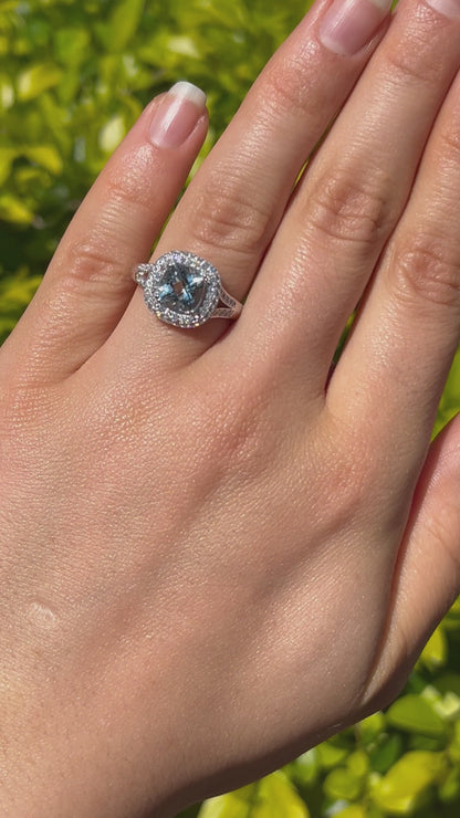 14K gold aquamarine and diamond double halo ring by Browns.