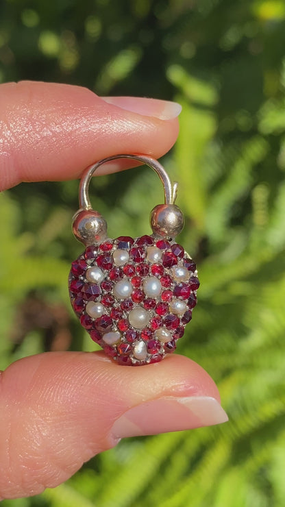 9K gold Victorian opal, garnet, seed pearl, and diamond locket and padlock clasp, circa 1850's.