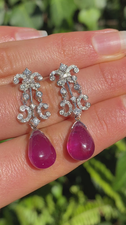 18K gold glass-filled ruby and diamond drop earrings.
