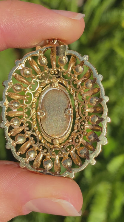 14K gold seed pearl hand painted miniature pendant, circa 1900.