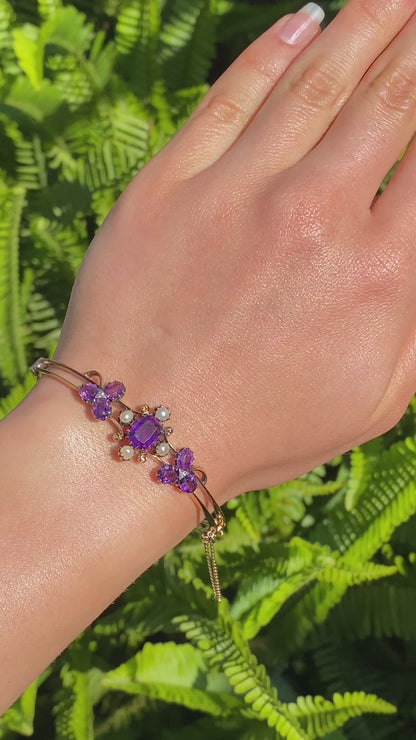 14K gold Edwardian amethyst, pearl, and diamond bangle.