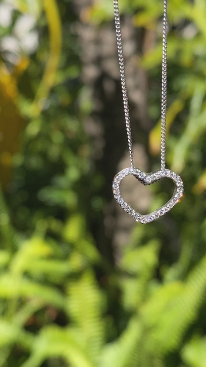 9K gold diamond heart pendant.